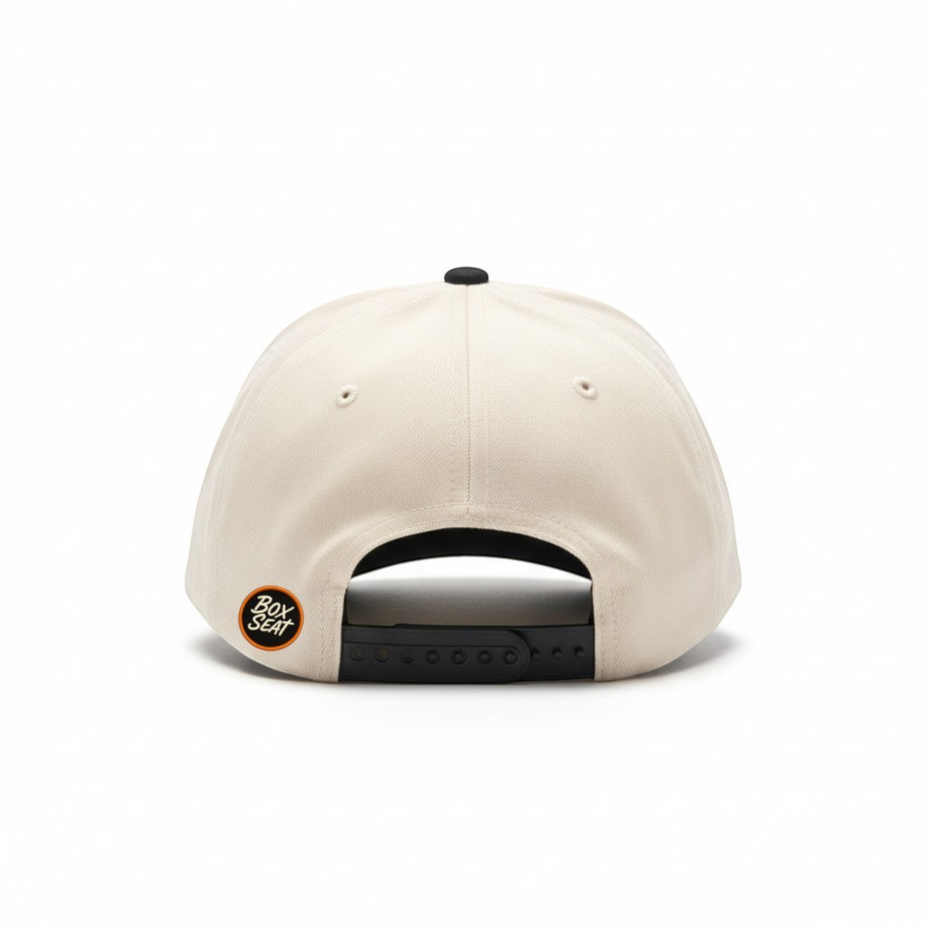 Rear view of a beige BOX SEAT K-Town Richardson 356 snapback hat with a black button and adjustable strap.