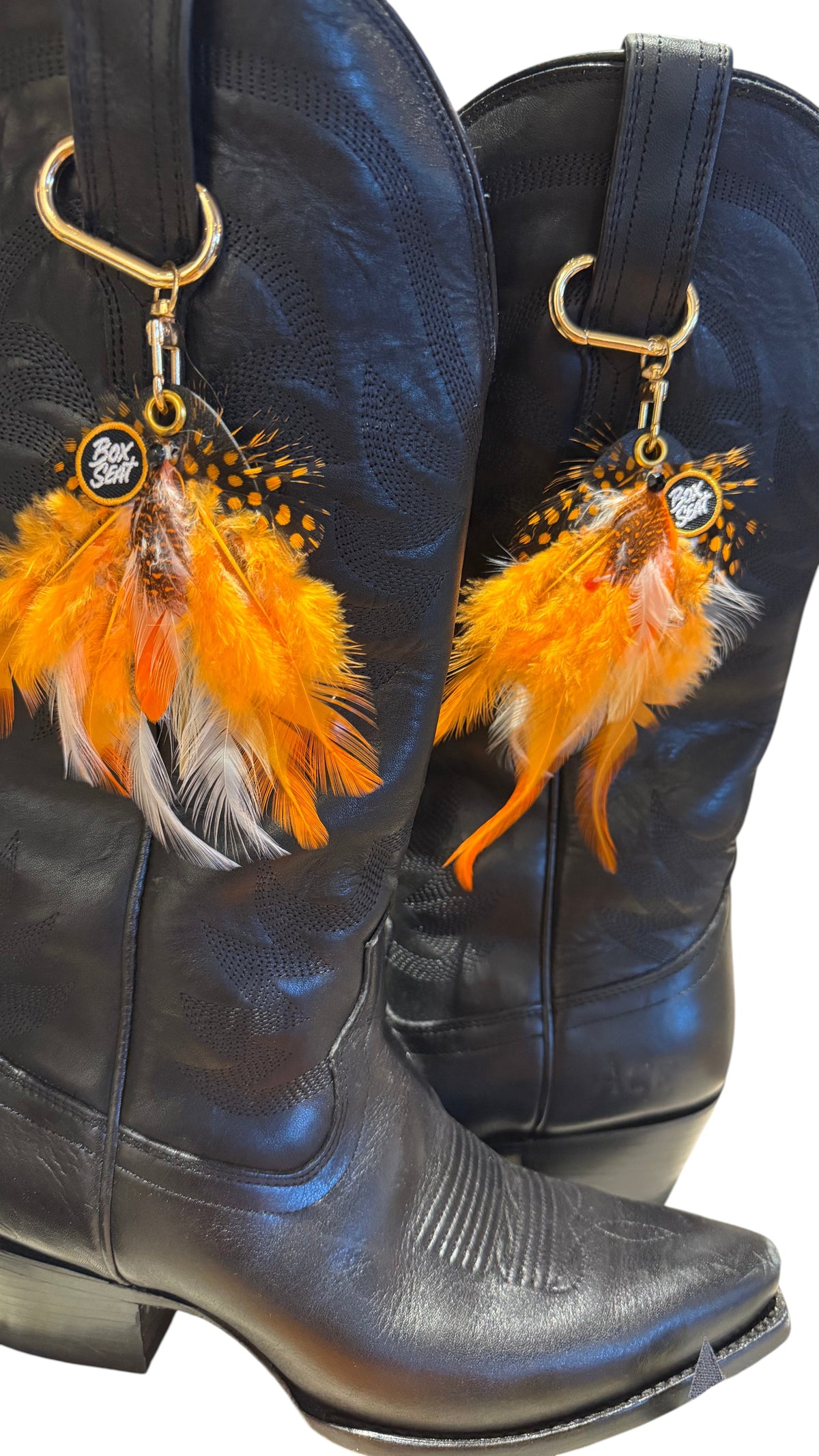 Feathered boot charms