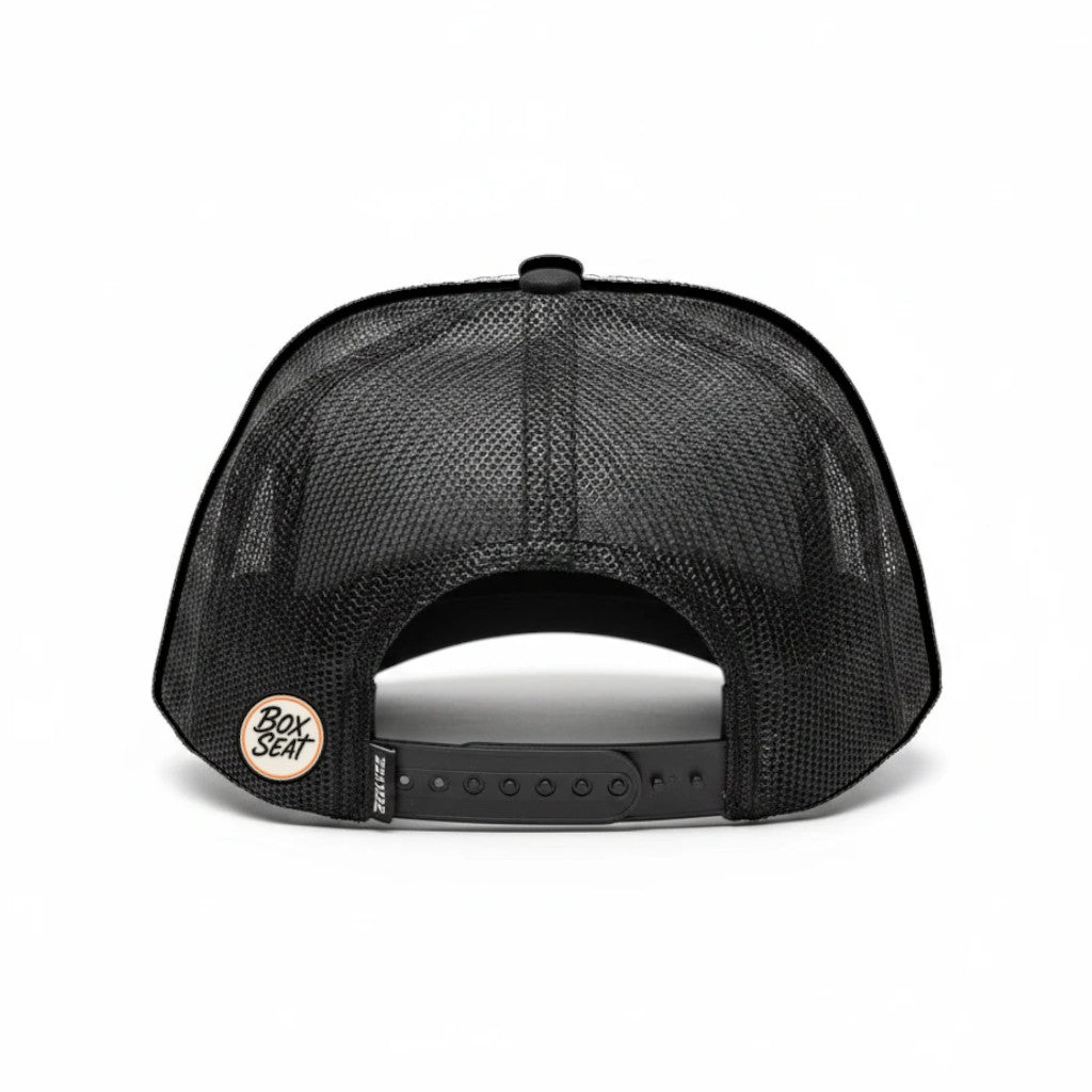 Back view of a black BOX SEAT Goodluck Richardson trucker hat featuring a breathable mesh back and snapback closure.