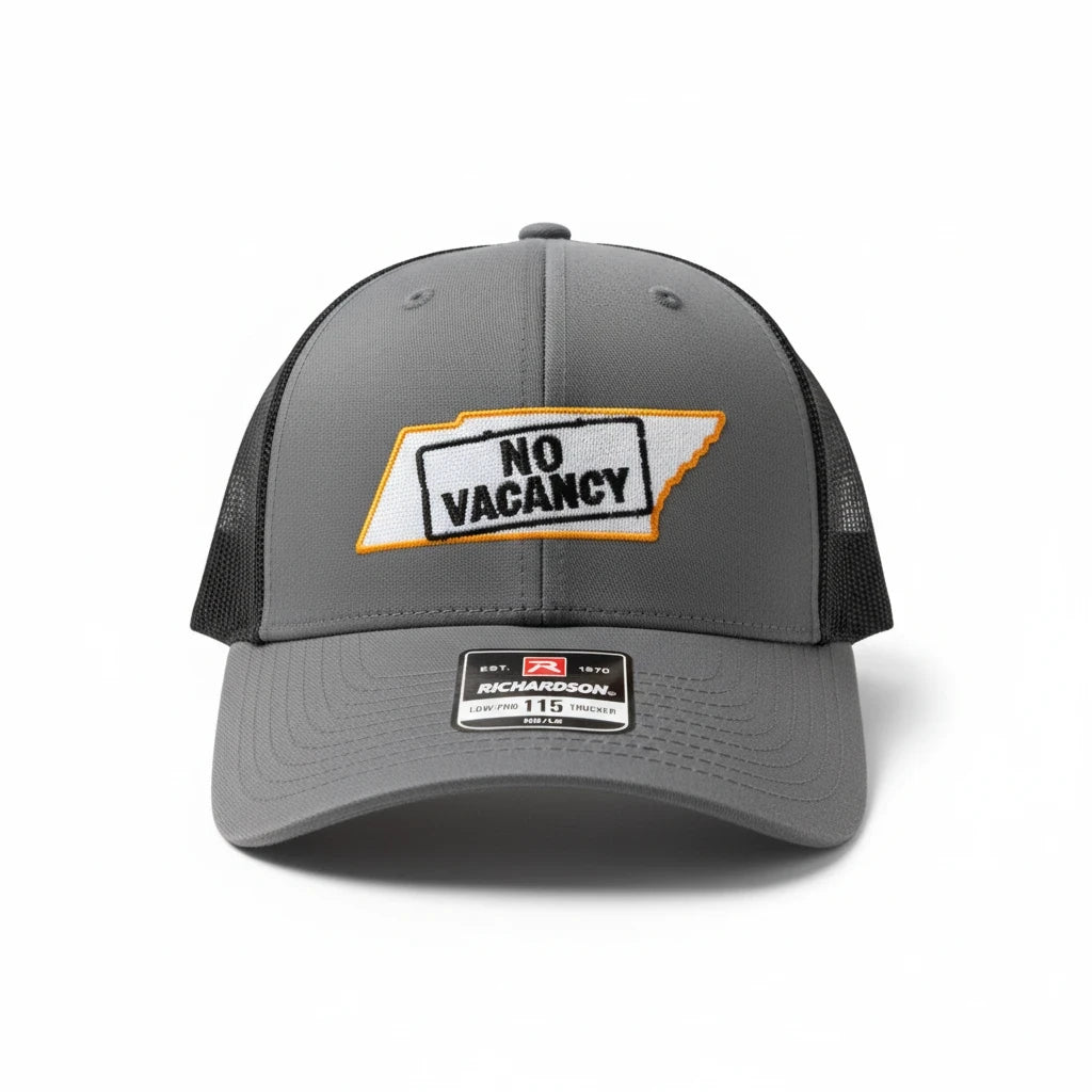 BOX SEAT charcoal and black Richardson 115 low-profile trucker hat with No Vacancy in Tennessee embroidered patch