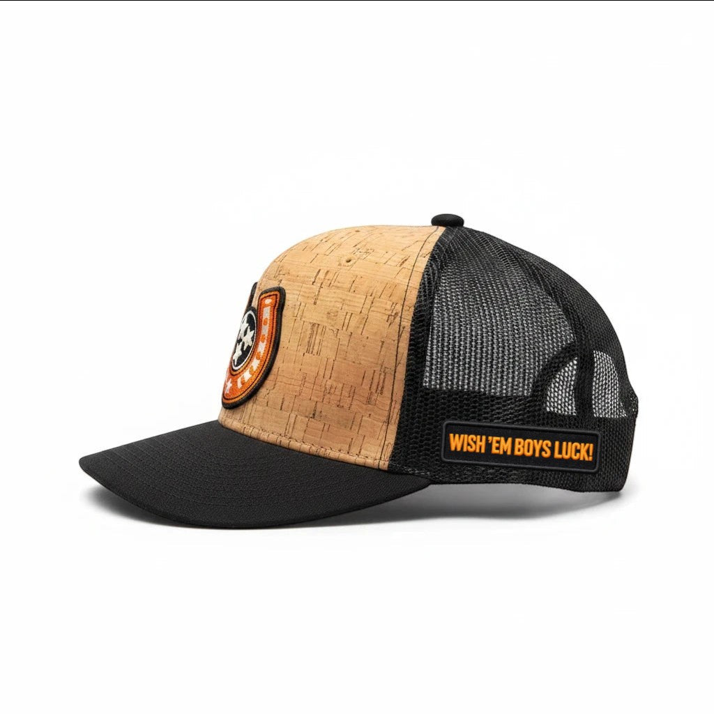 BOX SEAT Goodluck hat featuring a natural cork front panel, black brim, and breathable black mesh back.