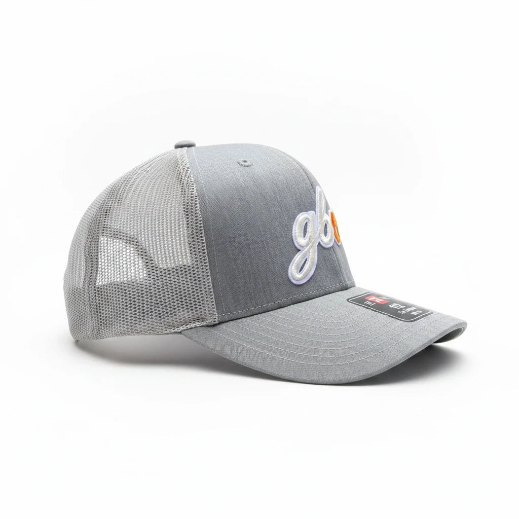 BOX SEAT gray Richardson 112 trucker hat featuring white script embroidery and a breathable mesh back panel