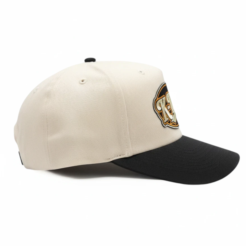 BOX SEAT K-Town Richardson 356 hat in cream and black with a detailed embroidered patch on the side profile