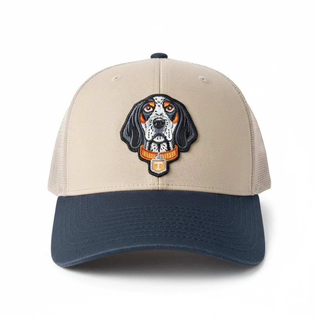 BOX SEAT smokey khaki and black trucker hat featuring an embroidered bluetick coonhound dog patch on the front