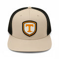 BOX SEAT Richardson 511 khaki and black trucker hat with an orange and white Power T shield patch on the front