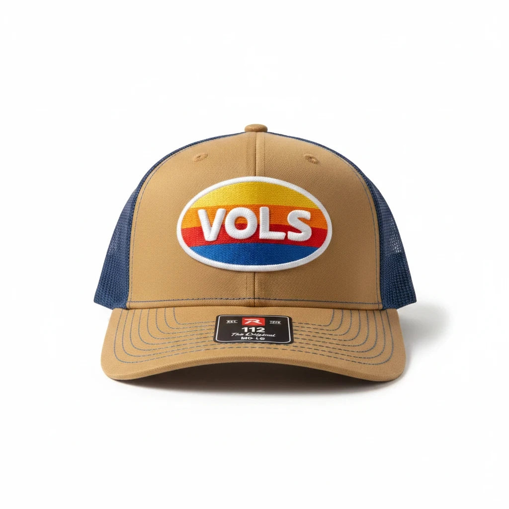 BOX SEAT Richardson 112 retro trucker hat in tan with a blue mesh back and a vintage VOLS oval patch