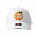 BOX SEAT white trucker hat featuring an embroidered orange fruit logo with GBO text on the front panel